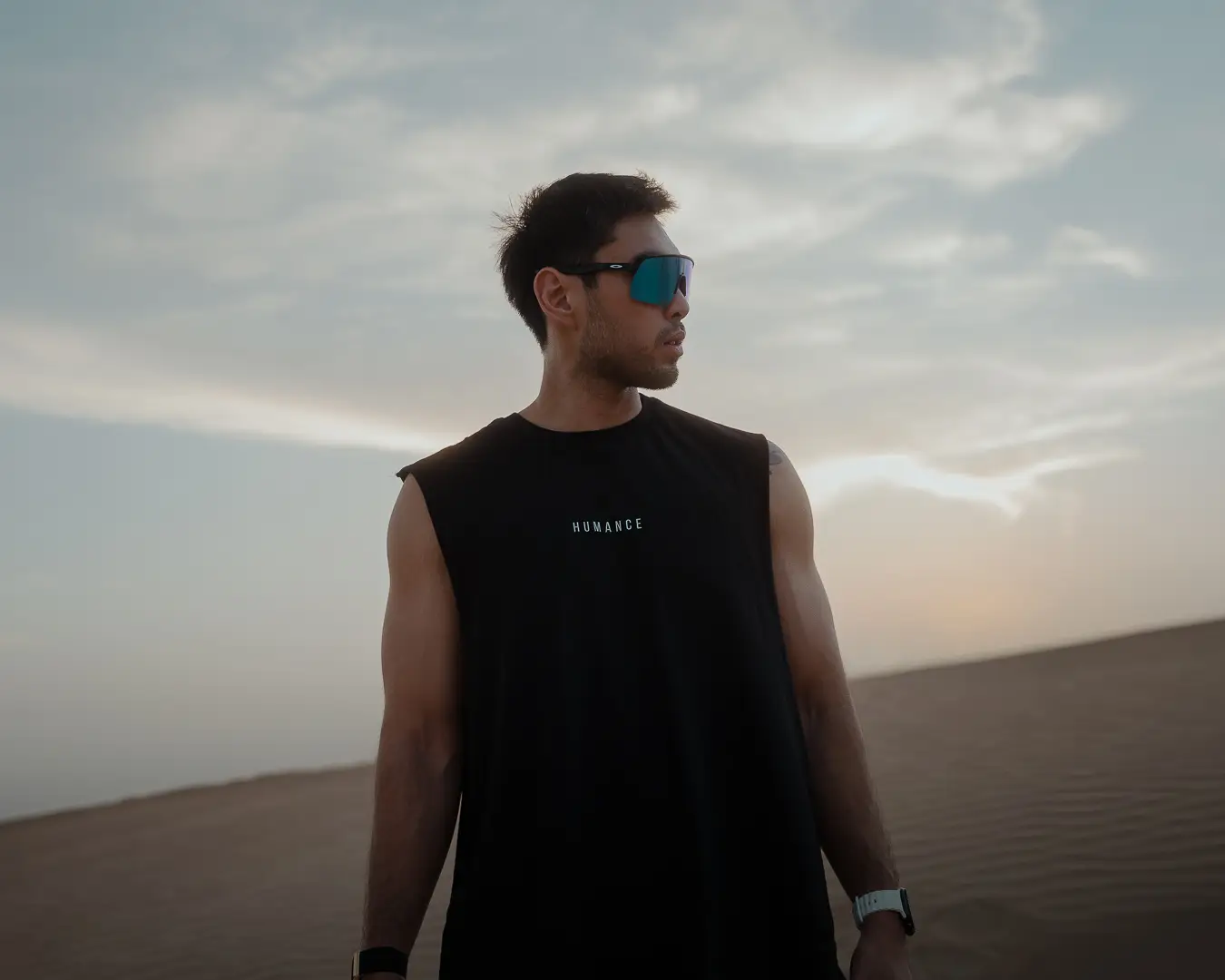 Athlete in a HUMANCE tee at dusk in the desert