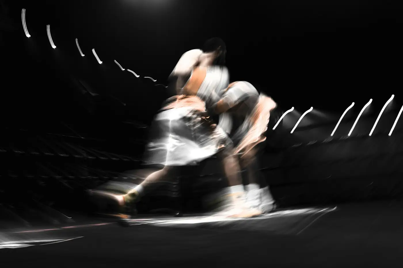 Two boxers exchanging punches, motion blur