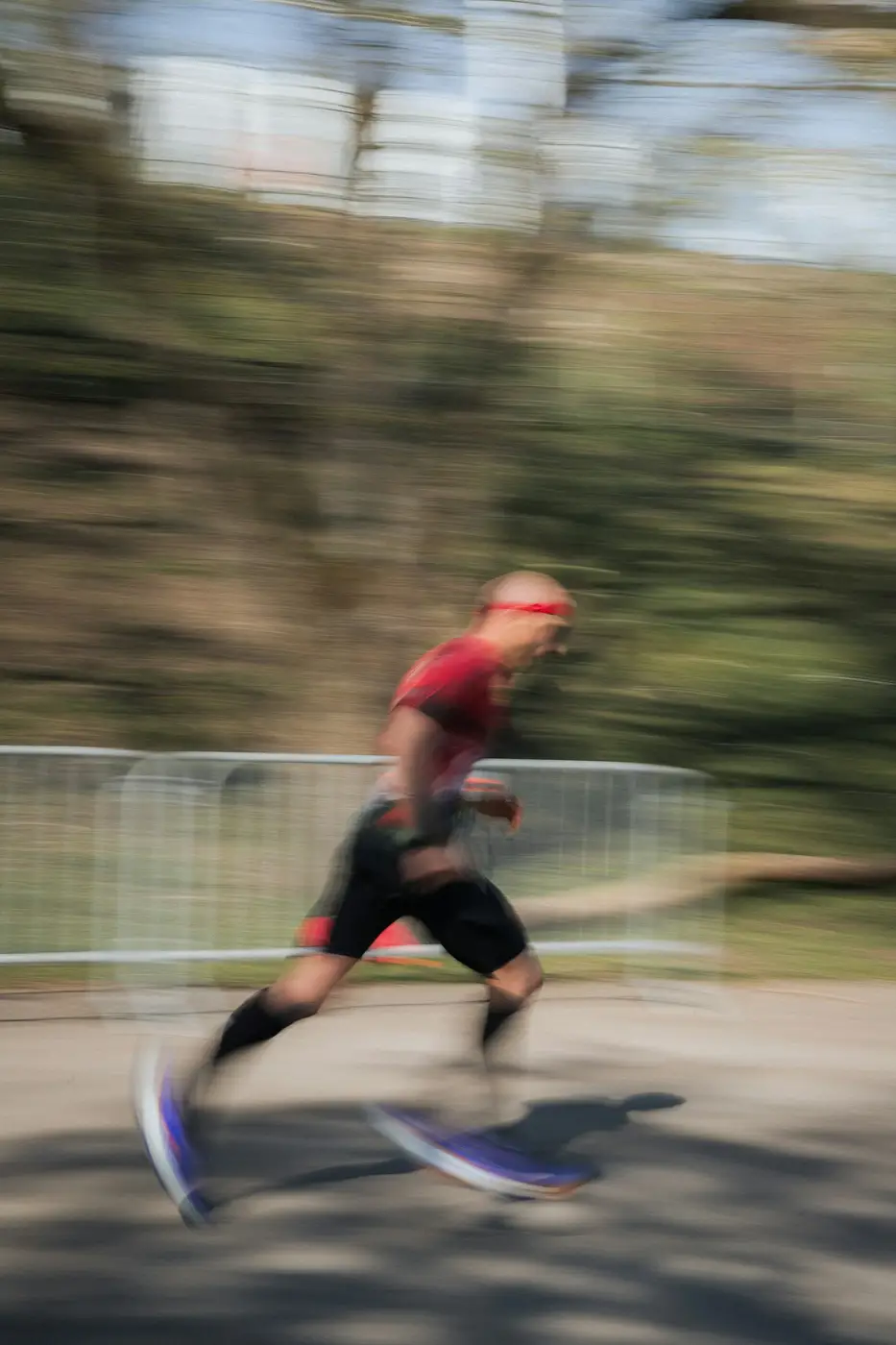 Runner in motion outdoors, motion blur